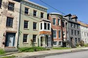 HEAT AND HOT WATER INCLUDED! Beautiful views from this renovated brick brownstone two story loft style apartment, in the heart of Newburgh&rsquo;s historic waterfront district. Enter building through two sets of original French doors to a charming and bright foyer. Exposed brick wall leading to second floor entrance into stunning apartment - with open floor plan - faux brick fireplace with handsome wood mantel - and chef&rsquo;s kitchen, complete with large island for prep, stainless farm sink, gas range with proper vent hood, microwave drawer, and pot filler faucet. Plenty of storage in the custom cabinets, with pantry, and deep drawers; penny tile backsplash and stunning granite counter tops; custom lighting. Head out to the deck and back yard for that morning cup of coffee or al fresco dining. Large open living and dining areas with views of the Hudson. Sweet office with bay windows - working from home with incredible views all day long! Second level of apartment has two ensuites - both with charming mantels and new ceiling fans; one with a clawfoot soaking tub, and large closet; the second ensuite with river views, walk in closet with organizing system, and a gorgeous marble bathroom; shower with glass doors, two shower heads and storage niche, and more views! Laundry on bedroom level for convenience. Walk up attic with storage. Gleaming hardwood floors throughout. New ductless mini splits for air conditioning. Plenty of space to garden. Private deck. Beautiful apartment! One pet welcome.