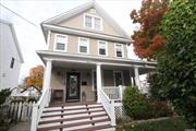 THIS IS IT...LOOK NO FURTHER! Stunning Victorian in the heart of Bayside Village. Gorgeous corner property with southern exposure. Absolute dream location: 3 blocks to Bell Blvd, 2 blocks to Crocheron Park, 5 minute walk to LIRR. Truly outstanding Trex wrap around porch, fully fenced in yard complete with sprinklers to water a most impressive and mature garden. This extraordinary home is filled with original details: remarkable L-shaped wooden staircase from first to top floor, high ceilings, crown moldings and decorative trim, wood burning fireplace, hardwood bamboo floors throughout the house. Rooms are spacious with more than enough storage. Separate entrance to renovated basement. Also convertible to a 2 family with proper permits. 2 car garage has second level storage along with two additional driveway parking spaces. Incredible value with taxes under 10K! COME SEE YOUR NEW INCREDIBLE HOME., Additional information: Appearance:Excellent