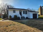 This split-level home features three spacious bedrooms and two full bathrooms, offering ample room for comfort. The eat-in kitchen is perfect for casual dining, while the inviting living room offers a cozy gathering space. The property boasts a fully fenced yard providing a private outdoor area for relaxation and play!