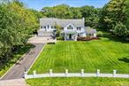Welcome to this exquisite 5-bedroom, 4.5-bath Colonial home, nestled on a sprawling acre of meticulously landscaped grounds in one of the most sought-after neighborhoods. This expansive residence seamlessly blends classic architectural elegance with modern amenities, offering the perfect balance of comfort, luxury, and functionality. Step inside to a grand two-story foyer that leads to expansive living and dining rooms, ideal for both intimate gatherings and large-scale entertaining. The chef-inspired kitchen boasts stainless steel appliances, stone countertops, custom cabinetry, and a spacious island perfect for meal prep and casual dining. The adjoining family room features a cozy fireplace, creating a welcoming atmosphere for relaxation. The private master suite is a true retreat, featuring a spa-like en-suite bath with a soaking tub, dual vanities, and a large walk-in closet. Four additional generously sized bedrooms offer ample space for family and guests, each with easy access to well-appointed bathrooms. The finished lower level provides even more living space, perfect for a media room, home gym, or playroom. Outside, the park-like grounds are an entertainer&rsquo;s dream, with a large deck, stone patio, and expansive lawn surrounded by mature trees, offering both privacy and tranquility. The home&rsquo;s impeccable curb appeal is enhanced by its charming colonial architecture and manicured landscaping. This residence is ideally located in a highly desirable Hewlett Harbor, offering convenient access to top-rated schools, parks, shopping, and major highways, while providing the serenity and privacy of a suburban retreat. With its combination of timeless beauty, sophisticated features, and exceptional location, this home is a rare find. Don&rsquo;t miss the opportunity to make it yours!, Additional information: Appearance:Excellent