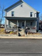 INVESTORS PARADISE! This triplex is the project that youâ€™ve been waiting for! 2 upstairs apartments each have 2 beds and 1 bath. The first floors apartment contains four bedrooms and 2 baths.  Restore this turn of the century home to it&rsquo;s optimal investment and income opportunity!