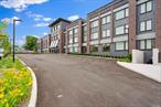 Immediate occupancy available in The Rose at Great Neck. 40-New Luxury Condominiums on the North Shore of Long Island. This brand new mid-rise building is now over 30% sold. Offering an unparalleled residential experience and amenities including virtual doorman services, welcome lobby, resident lounge with YouTube TV, plus gym fitness center with treadmill, bike and free weights. Retreat to the rooftop common area and hang out at the perfect place to unwind with seating and enjoy the outdoors that include distant views towards New York City. Private indoor garage parking and outside private lot parking. The earliest residents have preferred choice of parking spaces. The allure of The Rose extends beyond its walls as residents enjoy instant access to the Village of Great Neck Estates Waterfront Park featuring Olympic sized swimming pool plus small pool, 7 tennis courts plus indoor tennis court in a bubble, marina and dock area, direct waterfront esplanade with views of Little Neck Bay, Douglas Manor and the Throgs Neck Bridge, shoreline access, baseball and soccer fields, playground, basketball, pickle ball, handball courts and snack bar. The Rose was creatively designed by famed architects Mojo Stumer with the very best of quality and modern sophistication. Exterior brick and metal panels accent the solid structure. Three floors high with a mix of 1 bedroom, 2 bedroom and 3 bedroom options in this new building. Unit 202 is two bedrooms and two baths, approximately 1, 172 sqft, private laundry. Big windows in the condo bring in natural light. Sleek modern kitchens to spacious living areas and stunning bathrooms, every aspect of this building reflects a commitment to luxury and comfort. Various golf courses within close proximity and nearby to the famous Americana Manhasset shopping. Just 0.7 miles to the Great Neck LIRR train station that boasts a direct route to Penn Station and now Grand Central Station in Manhattan. Enjoy the suburban lifestyle at the pinnacle of luxury living in Great Neck with all its town amenities just 19 miles to midtown Manhattan and a short jaunt to international airports. Welcome home.