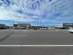 High Visibility location on a 140 x 91 Lot, Great Location on Main Road. Perfect for Auto Repair, Auto Sales Or Boats sales. Office building or so much more.