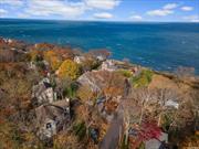 Experience breathtaking coastal living with stunning year-round water views in this custom-built Victorian-style home. Located on a quiet, dead-end street in Sound Beach, this elegant residence is just a few steps from the water, offering panoramic views from the wrap-around front porch and throughout the home. Marvel at the beauty of sailboats and the distant Connecticut shoreline from your serene, move-in ready retreat.Inside, high-quality finishes abound, including Andersen windows, hardwood floors, and a chef&rsquo;s kitchen with granite countertops and custom cabinetry. The home features four bedrooms, 2.5 bathrooms, and a master suite with vaulted ceilings, a walk-in closet, and a spa-like bathroom with a jacuzzi tub and dual vanity. Additional features include central air, a gas fireplace, a one-car attached garage, and a full basement with 9-foot ceilings.Perfectly designed for privacy and entertainment, the property sits on a raised lot for optimal drainage and includes a fully fenced yard with in-ground sprinklers and a backyard deck. Low annual taxes of $14, 158.85 make this home an attractive choice. Immerse yourself in the tranquility and style of this coastal gem.