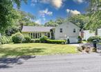 This bright and spacious freshly painted split level home features a sunken living room and a generously sized Family room. The dining area, located off a kitchen island , offers a beautiful view of the large backyard. The home included 3 bedrooms and 3 full bathrooms, providing plenty of room for family and guests. A lower family room with access to back patio, offers a wood burning stove for your enjoyment. Plenty of storage in 2 lower levels leading to laundry room. Additional amenities include a double car garage located on a quiet dead end street which is close to highways and shopping centers in Wykagyl.