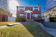 This charming four-bedroom, 3.5 bath colonial home in Jamaica Estates is situated on a spacious 60x100 property, offering ample room for both indoor and outdoor living. Featuring a cozy fireplace, the home boasts a welcoming atmosphere with plenty of natural light. The large backyard provides an ideal space for entertaining, gardening, or relaxing in privacy. Perfect for families, this property combines classic style with modern comfort. Close to all shopping , transportation , schools & house of worships!!! District 26...