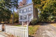 Step into the grandeur of this 1840s masterpiece, situated on an expansive half-acre lot. Boasting a magnificent triplex on top of a charming 1-bed garden-level apartment, this multi-family home perfectly balances historic elegance and modern updates. Original details abound, including soaring ceilings, intricate plaster moldings, hardwood floors, pocket window shutters, and massive pocket doors that seamlessly connect the living spaces. With 5 fireplaces present, 4 are original marble. The homeâ€™s sunroom and covered back porch overlook the sprawling yard, offering a serene oasis rarely found in the city. Newly updated kitchens and bathrooms with brand-new appliances offer modern functionality. Located near the Hudson River waterfront, shops, and dining, this home is a rare opportunity to own a piece of Newburghâ€™s architectural history, and perfect for anyone looking to live in a beautiful historic home on the best block in the City of Newburgh.