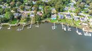 Welcome to spectacular buildable waterfront lot. A short stroll from the Hamptons and easy commute to NYC, this property brings every morning new possibilities. Its 75 feet of waterfront property waiting for you to build a Custom Home on! This property with beautiful view is absolutely perfect. Ideally located, it provides easy access to amenities such as shopping, fine dining, gated private beach, fishing pier, boat ramp, marina and more. Enjoy relaxed walks in the park, savor local flavors, or explore local boutiques - this location accommodates all tastes. The property is a blank canvas and ready for transformation!