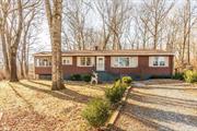 Welcome to this charming ranch home, situated on a peaceful cul-de-sac in the heart of Southern Dutchess. Nestled on a private 0.48-acre lot, this property offers the ideal setting for single-level living. Step into the sun-drenched living room, seamlessly flowing into a cozy family room featuring a classic brick fireplace, perfect for relaxing evenings at home. The layout includes 3 bedrooms, 1 bathroom, and an additional den/home office, providing plenty of versatile space for todayâ€™s lifestyle. The eat in kitchen, with its large dining area and Corian countertops, opens to a generous enclosed porch, an inviting space to entertain family and friends. Located just minutes from the Village of Fishkill, shops, restaurants, parks, and major commuting routes, including I-84, TSP, and Route 9. This home is ready for new owners to bring their personal touch and create lasting memories. Donâ€™t miss this incredible opportunity to make 31 Moccasin View Rd. your forever home.