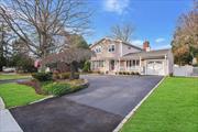 Looking for a colonial in Saint James? Look no further! This beautifully maintained 4 bedroom, 2.5 bath center hall colonial on a .25 acre property is waiting for you! This home features an updated Eat-In kitchen with cherry cabinets, granite countertops, propane cook-top, farm sink and stainless steel appliances (the oven is brand new), formal dining room, living room with wood burning fireplace, family room and a gorgeous, 3 year old sun-room! There are hardwood floors throughout, crown moldings, A/C is provided by 6 efficient wall units. Full basement, 200 amp electric, updated heating system, in-ground sprinklers. The front features a circular driveway, the back has a large shed, composite deck and is great for entertaining. There is even room for a pool! Make your appointment to see this great home ASAP!