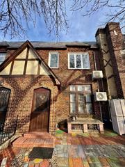 Modern updated English Tudor, high ceilings, attached garage. Private rear entrance with finished basement. Close and convenient to all.