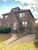 ALL SOLID BRICK LEGAL 2 FAMILY WITH 14.7 x 17.10 BUILT-IN 2 CAR GARAGE - IDEAL PRIVATE SPACE FOR HOME WORKSHOP OR STORAGE AREA FOR THE ENTREPRENUER. FINISHED BASEMENT & LARGE ATTIC WITH 2 WINDOWS - PERFECT FOR THE ARTIST OR ARTISAN - OFFERS MANY POSSIBILITIES. A COMMUTERS DELIGHT - CLOSE TO NORTHERN BOULEVARD ONLY 2 BLOCKS TO THE ENTRANCE OF THE AUBURNDALE LIRR STATION. IDEAL PROPERTY FOR OWNER OCCUPANT, EXTENDED FAMILIES OR INVESTORS. Its proximity to all NYC amenities including convenient public transportation, all major parkways, and expressways, provides easy access to Manhattan and all other boroughs as well as Long Island. Auburndale, Queens is known as a very vibrant community offering a wide array of great shopping, houses of worship, top-rated public and private schools, public parks, excellent casual and formal dining restaurants, pubs and cafes. Not Merely Just A Nice Place To Live But A Nice Way Of Living!  A LETTER OF PREAPPROVAL IS REQUIRED OF ALL PROSPECTIVE BUYERS REQUIRING FINANCING AND PROOF OF FUNDS FOR NON-FINANCED SITUATIONS. FOR A PRIVATE SHOWING E-MAIL A CURRENT PREAPPROVAL LETTER / PROOF OF FUNDS WITH 24HRS. NOTICE. The Elementary and High School are zoned for District# 26. The Middle School IS 25 is located in District 25. HOUSE IS SOLD AS IS DELIVERED VACANT AT CLOSING. MOTIVATED OWNER!