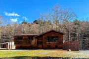 If peace and tranquility are what you&rsquo;re looking for than look no further than the Catskill Mountains and this gem of a home in the sleepy town of Grahamsville. This raised ranch has three spacious bedrooms on the main floor, a generous living room with original wood features, hardwood floors, and large picture windows, rear deck overlooking the rolling hills and a peaceful stream in your own backyard that is accessed from your formal dining room. The walkout finished basement includes hardwood floors, panel ceiling, and a full bathroom with pedestal sink and ceramic standing shower. Additionally, the finished basement includes two bonus rooms and large utility room with washer/dryer hookups and a sliding glass door to the backyard. The low taxes, quiet neighborhood, and beauty of nature makes it the perfect place to call home.