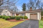 For your consideration, we are offering a beautiful 3 bedroom, 2 bathroom Mid Century Ranch in White Plains, New York. The home is well kept and sits on a lovely suburban street. There is a living room with gas insert fireplace, formal dining room off the kitchen (formica countertops) with access to the screened in porch with skylights which leads to the outdoor patio. A sprawling lawn greets you in the back yard for outdoor living activities. The basement is fully furnished and could be used as a playroom, office, man cave, etc. Attached 1 car garage and ample driveway for additional parking.