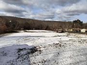 LOCATION, LOCATION, LOCATION....Now being offered. 2.6 acres of Prime Commercial/Residential property on US Rte 6 just outside of Port Jervis, NY. If you&rsquo;ve been looking for that extra-large commercial spot for your new business, look no further! This parcel used to be the site of the once famous Minisink Lanes Bowling alley. Concrete slab of the foundation still remains. Property has well, septic, electric and enough space to house your new business venture. Or maybe, you&rsquo;re looking to build some homes or an affordable housing complex. Whatever your next vision, stop by and take a look at this perfect multi-use/mixed-use, commercial/residential property today. Owner financing may be available for the well qualified buyer.