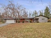 A rare find! Charming three-bedroom, two and a half bath mid-century modern home, on 1.3 acres, overlooking McCann Memorial Golf Course, and located within the Spackenkill School District. Enter home through welcoming foyer with original slate tile and coat closet, leading to the sun-filled sunken living room, den and formal dining room. Great entertaining space! New chefâ€™s kitchen with stainless appliances, double wall oven and natural gas stove top with vent hood; quartz countertops, tile backsplash, an abundance of cabinets and open shelving, including pantry cabinet and island storage. Enjoy that morning cup of coffee, sitting at the island, birdwatching through the picture window, overlooking the beautiful back yard with seasonal views of the golf course. Office with sliders to patio, laundry room and powder room conveniently located between kitchen and two car garage. Venture into the gorgeous four season room, surrounded by nature, through the walls of windows and skylights. You will be amazed by the gorgeous sunsets you see from this beautiful home. Primary ensuite with double closets and new bathroom with walk-in tile shower with glass door, and double vanity with medicine cabinets with LED lighting. The two additional bedrooms share the new hall bathroom with soaking tub with subway tile surround, double vanity and linen closet. Gorgeous hardwood floors and freshly painted throughout, custom lighting, ductless air conditioning, and natural gas heat. Large dry basement with plenty of room for storage and studio space. Close to Spratt Park, Vassar College, Marist College, shopping, and Metro North Poughkeepsie. Gorgeous home!