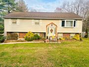 Well maintained move in ready bilevel home in the heart of Chestnutridge. This home does not disappoint. As you enter into the home, you will find many updates starting with the gleaming hardwood floors throughout the main level. The eat in kitchen has updated cabinetry, the dining area has updated doors leading to the deck area overlooking the heated inground pool and landscaped back yard. The hall bath leads into the adjorning primary bathroom. Next you will find 3 generous sized bedrooms. The lower level consists of a 4th bedroom with tiled flooring as well a a family room and bathroom, which houses the washer/dryer sink and toilet. Due to the size of the lower bathroom the possibility exists to move the laundry elsewhere, to make room for a shower/tub. Updates include roof, heating, house water filtration system, garage doors, gutters w/guard, electricity, vinyl siding , fencing