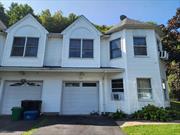 Welcome to this lovely 4-bedroom, 2-full-bath townhouse-style single-family rental located in the picturesque and historical section of West Haverstraw. This inviting home features hardwood floors throughout, creating a warm and welcoming atmosphere. The upper level has three spacious bedrooms, a full bath with modern fixtures with an eat-in kitchen with a breakfast barâ€”perfect for chatting with the chef while meals are being prepared, a generous-sized living room, a formal dining room for family meals or hosting guests. The lower level has a cozy bedroom with ample space, another beautiful full bath, a large living room, ideal for relaxation or entertaining guests, and a top-of-the-line washer and dryer located in the laundry room which also has great storage space. There is direct access to the garage for convenience. The lower level also leads to a private rear yard, offering an ideal space for outdoor relaxation and recreational activities. The backyard leads up to the scenic Hi Tor Mountain, providing a peaceful and private retreat. This home is located near excellent restaurants and Bowline Point Park, which has an Olympic-size swimming pool, water slides, a toddler pool, playgrounds, a volleyball court, walking paths, a fishing pier, and picnic areas. The Haverstraw Ferry landing, connecting to Ossining and the Metro North Railroad providing easy access to public transportation. Make an appointment today to see this rental property which is available for a one or two year lease, with option to renew.