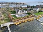 Water front 2 story A-Frame w/detached 1 1/2 car garage. Private Beach, Marina/boat ramp. 125ft bulk heading with 50ft dock that extends out to 2 jetski docks. Breath taking views of the sunset over the great south bay and forge river. New 2024 Hardiplank Siding, windows, pair of 9ft Andersen Sliding glass doors, Solar panels, A/C Condenser unit and Air Handler. 36 Stainless Steal Farm sink in kitchen with Marble Top Island and stainless wall oven. Inground pool with 2 infinity edges. 200amp electrical svc and 50 amp svc in garage. 32 gal hot water tank, 2 zone boiler system oil. Electric dog fence along front of driveway. Indoor outdoor lighting and exterior sonos system w/bose speakers all controlled with App on cell phone. Too many more perks to list., Additional information: Appearance:Mint, Green Features:Insulated Doors