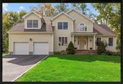 Welcome home to this picturesque colonial in the desirable, Preserve at Somers. The inviting stone walkway graces the front of this stunning home offering over 4200 sq ft and situated on a private, level lot. The grand two-story foyer leads to the open and functional floor plan. The first floor features an expansive eat in kitchen, formal living and dining room, home office/den, powder room and cozy family room with wood burning fireplace and sliders to an oversized paved patio...the ideal layout for entertaining! The second floor has a master retreat with his/her walk-in closets and large bath featuring soaking tub and stand alone shower. It is complete with three additional bedrooms and hall bath. The large, newly renovated, finished lower level is the ideal space for a game room, media/entertainment space or just about anything to fit your needs. This special is home is not to be missed!