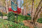 THIS UNIT HAS THE LOWEST MAINTENANCE ($790.35) OF ALL ACTIVE 1-BEDROOMS IN THE GARRETT PARK NEIGHBORHOOD. Discover this charming one-bedroom home in the tranquil north wing of the Bronxville Lodge. This sun-filled residence features classic 1930s details, including graceful archways, original French doors, high ceilings, and peaceful treetop views. Enjoy added privacy, as you only share one wall with neighbors in this quiet setting.The small kitchen was carefully redesigned by an architect to make the most of the compact space. This European-style kitchen features a window, two sinks, floor-to-ceiling storage, sleek countertops, and imported Italian tiles above the stove, blending practicality with style. Just outside the kitchen is a large rolling butcher block storage/server that is included in the sale. This piece brings additional function by providing another counter height surface to prepare and serve meals.The hall bathroom was updated in 2010, preserving its original 1930s character and tile. The renovation included new pipes, as well as a new vanity, commode, and floor tile.With a low monthly maintenance fee of just $790.35, this unit is conveniently located just steps from the Bronx River Pathway and only a quarter mile from the Bronxville Train Station, offering a quick 31-minute commute to NYC.