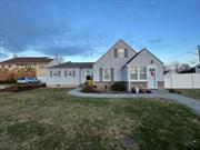 Huge Sprawling Expanded Cape, Updated Vinyl Siding, Fencing, Pergo Floors, Doors. New Bathroom, New Heating System, Hi Hats and New Pavers. Accessory Apartment for Mom!!, Additional information: Appearance:Excellent, Separate Hotwater Heater:Gas, Washer and Dryer Room, Large Shed, Updated and freshly painted wood deck.