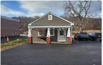 Bring your business to this great location! This is a 600sf stand-alone building, currently operating as a catering facility. Located just off W. Main Street, this property sits in the rear of the parking lot, offering some privacy yet very convenient. Its prime location boasts ample parking, making it an ideal spot for a variety of businesses, including food services, retail, or medical ventures. With great potential for customization, this space is perfect for bringing your entrepreneurial vision to life.