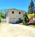Welcome to this beautifully kept split-level home offering the perfect mix of charm, functionality, and location! 3 bedrooms and 1.5 baths, this home features an EIK, hardwood flooring and a spacious open-concept living and dining area filled with natural light. Additional highlights include a cozy den, a full basement for extra storage or living space, and a separate entrance leading into a practical mudroom. Step outside to a private, park-like backyard-perfect for entertaining, playing or simply unwinding. Ideally situated just minutes from local parks, shopping, major highways and within a sought-after Seaford school district, this home checks all the boxes.