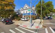 Corner Mixed Use Building For Sale. One Block to MURRAY HILL - LIRR. 2 Stores + 2 Residential Units. Location, Location, Location!