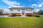 A/O 1/10......6 Edwards Drive -....This 3-bedroom, 3-bathroom raised ranch sits on a 1-acre corner lot in Pine Bush. Built in 2001, the home offers 1, 832 sqare feet of living space. The main level features hardwood floors, a living room, dining area, and a kitchen that leads to a large deck. The primary bedroom includes an ensuite bathroom, and two additional bedrooms offer plenty of space. The lower level has a family room, a recreation room, and a utility area with a washer/dryer hookup. The property includes a 2-car attached garage and a standalone garage for extra storage. Heating is forced air powered by oil. Taxes are $8, 264 annually. With plenty of outdoor space and a quiet corner lot, this home is perfect for relaxing or entertaining.