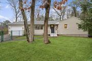 Adorable 3 bedroom, 1 bath ranch that includes brand new Anderson windows, vinyl siding, Trex deck in both front and back, new oil tank, fireplace insert and baseboard in the living room. The living room opens to the dining area and eat-in kitchen, including a new SS stove and fridge. Off the dining area, you will find a light and bright cozy family room with a fireplace and sliding door that opens to the new oversized deck. The property is just shy of a 1/2 acre and is very private w/ room for a pool. Located near all the N. Fork has to offer such as beaches, shopping, restaurants, vineyards and breweries, this is a must see.