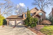 Welcome to one of the most unique and high-quality crafted homes in the heart of Franklin Square. This home is situated on an 11, 317 sq foot lot with a living area of over 3, 700 sq ft. Steel and wood constructed, entirely solid brick, 75 year roofing shingles with 2 Fireplaces (Gas/Wood) and 7 heating zones (2 Radiant/5 Baseboard). A stunning 340 sq ft Solarium with Gas Fireplace and Radiant heat overlooking the large property. Eat-in-kitchen with High-end appliances (Viking, Thermador, Sub Zero and Bosch) with open layout into family room. Custom Mill-work throughout Kitchen, Family Room, Dining and Living Room. Outdoor covered Kitchen Area with 60inch Viking Gas Grill w/2 side burners, Wood Oven, Granite counters. Other features to highlight are Central-vac throughout, Whole Home water Filtration, 7 zone sprinkler system, 2 car garage and much more. Located within the Franklin Square School District (Polk Elementary / Carey High School).