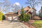 Welcome to one of the most unique and high-quality crafted homes in the heart of Franklin Square. This home is situated on an 11, 317 sq foot lot with a living area of over 3, 700 sq ft. Steel and wood constructed, entirely solid brick, 75 year roofing shingles with 2 Fireplaces (Gas/Wood) and 7 heating zones (2 Radiant/5 Baseboard). A stunning 340 sq ft Solarium with Gas Fireplace and Radiant heat overlooking the large property. Eat-in-kitchen with High-end appliances (Viking, Thermador, Sub Zero and Bosch) with open layout into family room. Custom Mill-work throughout Kitchen, Family Room, Dining and Living Room. Outdoor covered Kitchen Area with 60inch Viking Gas Grill w/2 side burners, Wood Oven, Granite counters. Other features to highlight are Central-vac throughout, Whole Home water Filtration, 7 zone sprinkler system, 2 car garage and much more. Located within the Franklin Square School District (Polk Elementary / Carey High School).