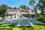 Stunning new construction situated on a 1.60+\- acre flag lot near the village of Sag Harbor, across from Little Peconic Bay. In a completely private, tranquil setting, this modern traditional style home features 7 bedrooms, 9 full and 2 half bathrooms, and total living space including the lower level of 7, 985 square feet. The main level features a double-height foyer leading to a great room with an open kitchen, living room, and family room with a fireplace. A separate dining room caters to formal occasions. A spacious junior suite is also featured on the 1st floor as well as a mudroom, pantry, and dedicated laundry room. On the second level, a grand primary suite features a fireplace and a large luxurious bath. 4 additional en-suite guest bedrooms are also included as well as a 2nd dedicated laundry room. This magnificent property also includes a 360-degree circular driveway, an attached 2-car garage, a heated gunite pool with a pool shelf, a spa, a bluestone patio, and an extensive deck for entertaining.