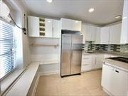 renovated, Updated Kitchen with stainless steel appliances, granite counter tops,  spacious 2 brs condo,  Laundry room in the basement, conveniently located 2 blocks to Broardway LIRR, and 2 blocks to Northern blvd with all the bus lines, shops, restaurants. Must see!