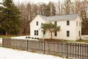 A serene landscape is seen through the glass wall of the Great Room at 327 Water Street Road. A large lawn sprawls in front of you, then dips down to give way to the Claverack Creek. Beyond the creek the bank rises again, a wall of pine forest. A landscape unique to the historic Glenco Mills neighborhood just ten minutes south of the heartbeat of the Hudson Valley, the quaint city&rsquo;&rsquo; of Hudson, New York. Originally built c1920, Water Street Road has been beautifully restored by the current owner, a designer and tastemaker by trade. That is evidenced in the details here walls the perfect, indiscernible shade of white, nuanced lighting and custom woodwork. The epicenter of the first floor is the vaulted Great Room, with its wall of glass and decorative beams. The kitchen is sleek but inviting with its large center island and warm grey countertops. The room is expansive, a place you can spend all day, with room for big, comfy seating and a long kitchen table. A formal sitting room lies at the front of the house, you&rsquo;ll pass a powder room with Waterworks hardware and a mudroom on the way there. A master suite completes the first floor, its large bathroom has a double vanity and extra wide shower, and a walk in closet. Upstairs there are two bedrooms and a sizable office that could be used as additional sleeping quarters. They share a beautiful, large bathroom with handpainted blue tile, a giant soaking tub and a separate shower. Outside, perched above the creek, the current owners have added a heated saltwater plunge pool. The HVAC has all been updated, the roof is a standing seam metal. 10m to Amtrak and 2.5h to NYC.