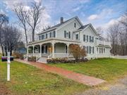 Step back in time with modern amenities at this stunning 175-year-old farmhouse, originally built by Theodore Denton in circa 1850. Nestled in the scenic Wawayanda countryside, this home is full of charm and character, with original hardwood floors and distinctive architectural details. Five spacious bedrooms, each with its own en-suite bathroom, offer comfort and privacy for everyone. The upstairs features a convenient Jack-and-Jill bathroom for added flexibility.The home has been thoughtfully renovated to blend historic charm with modern upgrades. Recent updates include a new roof, heat pumps and boiler (both just 2 years old), new septic, spray foam insulation, and updated electric. The farmhouse kitchen boasts butcher block counters, an Bertazzoni induction range, and a beautiful blue stone counter island crafted from stone found on the property. A renovated laundry room is conveniently located off the kitchen.Enjoy the outdoors with a rebuilt front porch, heated walkway with snow sensor, and a level backyard perfect for relaxing by the fire pit or entertaining guests. The full apartment in the back features its own balconyâ€”ideal for sipping your morning coffee and enjoying the views.Perfect for multi-generational living or potential rental income, this property offers the option to live in one unit and rent the other. The large carriage house provides ample storage space for hobbies, vehicles, or future projects.Located just minutes from Legoland, the Heritage Trail, Sons Orchards, and a variety of top-rated restaurants, breweries, and wineries, this is the perfect blend of historic charm and modern convenience. Only an hour from NYC, you can enjoy the peaceful countryside without sacrificing proximity to the city.Designed and constructed by a renowned property owner featured on HGTV, this home truly stands out as a piece of living history with contemporary flair.Donâ€™t miss your chance to own this unique gem!