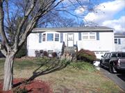 West Nyack, NY â€“ Expanded Ranch in the Clarkstown South School District â€“ with the sought-after open floor plan! The kitchen with oversized island will delight the cooking enthusiast & includes a wine refrigerator. The formal dining room is perfect for hosting dinners for large gatherings. The living/family room with gas fireplace opens to the 2-tier wrap-around deck leading to the above-ground pool. A full-finished basement with summer kitchen & full bath provides walk-out access. The level side & back yards can perfectly accommodate your warm-weather pool parties, BBQs & outdoor games. Located near to all major roadways, public transportation, restaurants, shopping malls & every convenience imaginable, this home is ready to be yours!