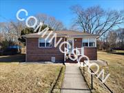 Discover the perfect blend of comfort and space in this inviting 2-bedroom, 1-bath brick home. Situated on a fully fenced, flat half-acre property, this home offers space to relax and grow. The exterior boasts a brand-new roof, composite decking at the rear, and a cozy front stoop.Inside, you&rsquo;ll find a newer eat-in kitchen featuring abundant cabinet space, a built-in china cabinet, and elegant Corian countertops. The updated bathroom is equipped with a luxurious jetted tub. Hardwood floors, preserved under pristine carpeting, add timeless character.The full unfinished basement, with an outside entrance, provides endless possibilities for storage, a workshop, or future finishing. A pull-down staircase leads to a spacious attic, ideal for additional storage.This home is equipped with oil heat, a propane stove, and individual AC units for year-round comfort. Whether you&rsquo;re hosting gatherings in the expansive backyard or enjoying the quiet charm of this cozy home, you&rsquo;ll feel right at home here.Don&rsquo;t miss this opportunity to make it yours!