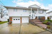 High Ranch with Updated Kitchen and In Ground Pool.