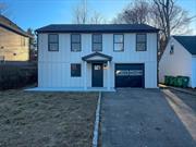 This wonderfully remodeled home is located one block from the inviting Beacon Daily, a short walk from Main St and mere minutes from the Beacon Train Station. Sitting in the shadow of a picturesque view of Mt Beacon youâ€™ll find this home with James Hardee Board and Batten siding, a large driveway and single car garage. Step inside to the first floor to see all new flooring throughout, the first floor bedroom, laundry room and delightfully color drenched bathroom. Walking up the steps to the second floor your eyes will be captivated as soon as the kitchen comes into view. The natural wood cabinets provide plenty of storage, the stainless steel appliances are brand new and countertops shine with the light provided from the black and brass pendant lights above. The open kitchen flows into the living room with its fresh paint and new windows. Rounding out the second floor is the main full bathroom, the front bedroom and rear bedroom with its attached full bathroom. The inviting three season room at the rear of the house has large windows allowing for an abundance of sunlight on a sunny spring day and a view of the outdoor entertaining area. As if that wasnâ€™t enough this home has a brand new central air system and heat pump providing a relaxing and efficient climate. This homeâ€™s location, beauty and efficiency make it a must see!