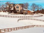 Welcome to Dream Mountain Ranch, Where Eagles Soar and Horses Play. Perched atop a mountain at the top of Eagle Crest Road, this breathtaking contemporary colonial home and horse ranch offers panoramic views of the Hudson Valley. Set on over five acres, the property features multiple stone patios, three horse paddocks, a large outdoor riding arena, and a four-stall barn equipped with a heated tack room, wash stall, and ample storage. The barnâ€™s layout allows for easy conversion into two additional stalls, catering to equestrian enthusiasts. Step through the front door into a grand foyer with soaring ceilings and gleaming hardwood floors that set the stage for elegant country living. The chefâ€™s kitchen is a culinary dream, boasting granite countertops, a six-burner gas stove with an expansive range hood, and plenty of space for meal preparation and entertaining. The living roomâ€™s floor-to-ceiling windows flood the space with natural light while framing the stunning landscape. Step out onto the massive life-proof deck to fully immerse yourself in the serene surroundings. Ascend the sweeping staircase to the second floor, where architectural magnificence continues. Overlooking the living room below, the second-floor landing offers more opportunities to soak in the extraordinary views. The luxurious primary suite features its own private balcony, a spacious walk-in closet, a cozy fireplace, and a spa-like en-suite bathroom with a walk-in shower, a soaking tub, dual vanities, and heated floors for ultimate comfort. The second floor has two additional generously sized bedrooms with ample closet space, a second full bathroom, and a convenient laundry room. The finished walk-out basement adds 910 sq. ft. of versatile living space, bringing the total to 4, 117 sq. ft. This lower level opens onto a stone patio overlooking the paddocks and picturesque countryside. Additional features include a two-car garage and a mudroom designed for practicality and convenience. Whether youâ€™re seeking a forever home or a serene country retreat, Dream Mountain Ranch is truly one of a kind. Located just 15 minutes from Garnet Medical Center and less than two hours from New York City. This extraordinary property offers an unmatched blend of luxury, functionality, and natural beauty.