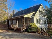 Set on just under an acre of wooded land, this spotless, well-built cape offers quality construction and thoughtful design throughout. The main floor features an eat-in kitchen, a spacious living room with sliders to a screened-in porch, two bedrooms, and a full bathroom. Upstairs is an expansive space that works beautifully as a primary suite, with a bedroom, full bathroom, and room for an office or sitting area. Additional highlights include a welcoming front porch, a built-in garage, and a large basement with high ceilings thatâ€™s ready for a workshop, storage, or additional living space. Surrounded by towering pines, this property feels peaceful and secluded while keeping you close to everything you need. Less than 15 minutes to bustling Rhinebeck and just a short drive to Staatsburgâ€™s 1, 000+ acres of state land and its golf course, marina, and walking trails, this home is ideally located for enjoying everything the Hudson Valley has to offer. Move-in ready and built to last!