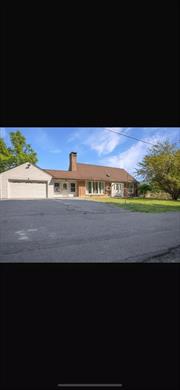 CHARMING MID-CENTURY BRICK CAPE WITH MOUNTAIN VIEWS.This four bedroom, two bath mid-century classic brick cape is a true testament to quality craftsmanship and timeless design. Nestled on a quiet, low-traffic street, this sun-drenched home offers breathtaking views of the Shawangunk Ridge through its expansive windows.Say goodbye to weekend house projects - this home is move-in ready, with all the work already done for you.The first floor features an open floor plan that flows seamlessly, starting with a cozy living room complete with a wood-burning fireplace, a spacious kitchen with stone countertops and a convenient eat-in dining area. A charming, enclosed breezeway provides additional space for larger gatherings and effortless indoor-outdoor living. Original hardwood floors run throughout the first floor, adding warmth and timeless appeal. Two bedrooms and a full bath complete the main level.Upstairs you will find two generously sized bedrooms and a second full bath, offering added privacy and comfort. The oversized one-car garage provides ample storage while the full basement houses the home&rsquo;s mechanicals and includes a recreation space.The front of this brick home overlooks a serene, wooded area offering privacy and a peaceful connection to nature while the back of the house, along with the above-ground pool showcases stunning views of the majestic Shawangunk RidgeIdeally located close to town yet tucked away for tranquility, this home combines convenience with breathtaking surrounds, Don&rsquo;t miss the opportunity to own this meticulously maintained classic gem!