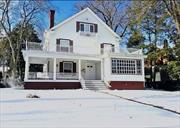 Discover the timeless charm of this 1915 Colonial on Poughkeepsieâ€™s desirable Southside, perfect for investors or owner-occupants. With a professional suite ideal for doctors, lawyers, or remote professionals, this property blends home and work seamlessly.This spacious home features refinished hardwood floors, a new high-efficiency gas furnace, and oversized bedrooms, including a grand primary suite. The formal dining room, library, and family room add versatility and charm, while the wrap-around porch invites outdoor relaxation.The paved lot accommodates up to 14 cars, making it ideal for professional use. This move-in-ready home offers endless opportunities.