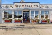 The New Moon Cafe&rsquo; nestled in the heart of East Quogue, offers a rare combination of charm and opportunity. The Cafe&rsquo; boasts a spacious 4, 600 sq. ft. interior with ample parking. This establishment is ready to shine as the centerpiece of the local dining scene. The ground floor features a large bar area, perfect for creating a lively social hub or a cozy dining space, allowing you to craft an atmosphere that suits your vision. The Cafeâ€™s layout is versatile, inviting endless possibilities for redesign or expansion to reflect your unique style and culinary ambitions.Adding to its appeal, the property includes two apartments upstairs, providing convenient on-site living or rental income potential. The outdoor brick patio offers a delightful space for alfresco dining, making it a prime spot to enjoy warm summer evenings or a casual weekend brunch. Whether you&rsquo;re looking to establish a thriving eatery or transform the space into something entirely your own, the New Moon Cafe&rsquo; combines location, size, and character in one exceptional package.