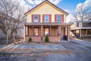 Check out this charming 4-bedroom home in historic Port Jervis, NY! Features a partially enclosed porch and warm, open floor plan with recessed halo lighting. Living room leads to a dining area with exposed brick walls, adding a modern-industrial vibe. Main level includes a bedroom with full bath. Bright kitchen boasts ample cabinets and access to a large deckâ€”ideal for outdoor entertaining. Deck steps descend to the backyard and driveway. Upstairs holds three bedrooms, a bonus room suitable for an office or playroom, and a full bath. One bedroom offers an enclosed balcony overlooking the backyard. New carpet in bedrooms. Washer/dryer hookups in basement with indoor access. Near West End Beach, trails, ice cream parlors, and Metro North Trains for easy commuting.