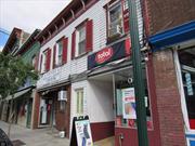 Incredible Opportunity to own this building on Broadway in the Center of Haverstraw. Steps away from the Hudson River. The Main floor contains 2 Stores, A celphone store and a Grocery / Bakery. While the upper floor Consist of a Spacious 3 Bedroom Apartment. Grab this opportunity before its gone.