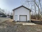 Rare opportunity to lease a versatile 18&rsquo; x 20&rsquo; garage space with soaring 12&rsquo; ceilings in the peaceful and private rear section of a 12-acre mixed-use community in Lagrangeville, NY. This fully functional garage features a large roll-up garage door and a separate front-door entrance, making it ideal for a variety of uses, including storage, seasonal work, or as a workspace for carpenters, landscapers, or snow plow operators. While utilities (electric, heat, water) are not available, the property includes approximately 500 sq. ft. of additional land, perfect for temporary parking or outdoor storage. Accommodates parking for up to 4 large vehicles. The property, once part of an old farm, offers a serene, quiet setting with exceptional privacy. Available January 1, 2025. Leasing terms are flexibleâ€”bring your ideas and let&rsquo;s make it work for you!