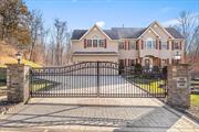 Beyond a wrought-iron gate, framed by stone pillars, this awe-inspiring Colonial estate reveals itself with an air of refined sophistication. A bluestone driveway and paver walkways lead you toward a home where timeless elegance and modern luxury are woven together. Surrounded by captivating landscapes and serenaded by the echo of birdsong, this property offers the perfect balance of privacy and community in a sought-after cul-de-sac neighborhood.Inside, the sun-drenched two-story foyer greets you with grandeur. Custom banisters rise alongside gleaming hardwood floors, while Norman shutters frame every window, adding soft touches of luxury. Flowing effortlessly, the open floor plan connects spaces designed for both entertainment and relaxation. At the heart lies the chefâ€™s kitchen, complete with a sprawling island, sleek finishes, and a generous butlerâ€™s pantry, perfect for preparation and storage.The living room, anchored by a glowing wood-burning fireplace, offers warmth and tranquility, while the stunning three-season room immerses you in natureâ€™s beauty year-round. Throughout the home, impeccable Rylex custom closets ensure every inch is as functional as it is beautiful.Adding to its allure is an additional 1, 390 sq. ft. finished walk-out basement that redefines comfort and versatility. This level is a sanctuary of leisure and luxury, featuring a media room with six leather recliner seats, a stylish refreshment bar, and a private home spa for moments of pure relaxation. The space adapts effortlessly to meet your lifestyle needs, from recreation to extra living quarters.Outside, the property continues to captivate. An impressive outdoor fireplace serves as the centerpiece to the hardscape patios, where evenings unfold under a starlit sky. The meticulously maintained grounds are adorned with flowing perennial grasses, nourished by a full sprinkler system. As twilight descends, landscape lighting illuminates the gardens, transforming the grounds into an enchanting nighttime retreat. A hidden dog fence ensures practicality without disrupting the beauty of the surroundings.Set within the Warwick School District, and located just one hour from NYC, this home offers a seamless blend of property and privacy.More than a residence, this is a statement of sophisticated livingâ€”an extraordinary retreat where beauty, comfort, and function exist in perfect harmony. Step inside and begin a new chapter where every day feels like a celebration of the exceptional.